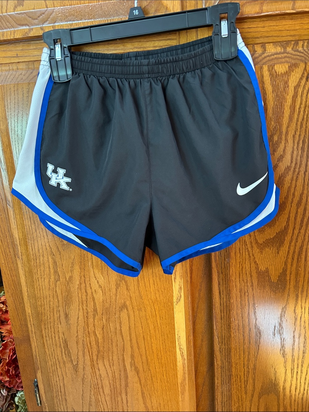 Nike Women's Black Athletic Shorts with Blue Trim and White Accents